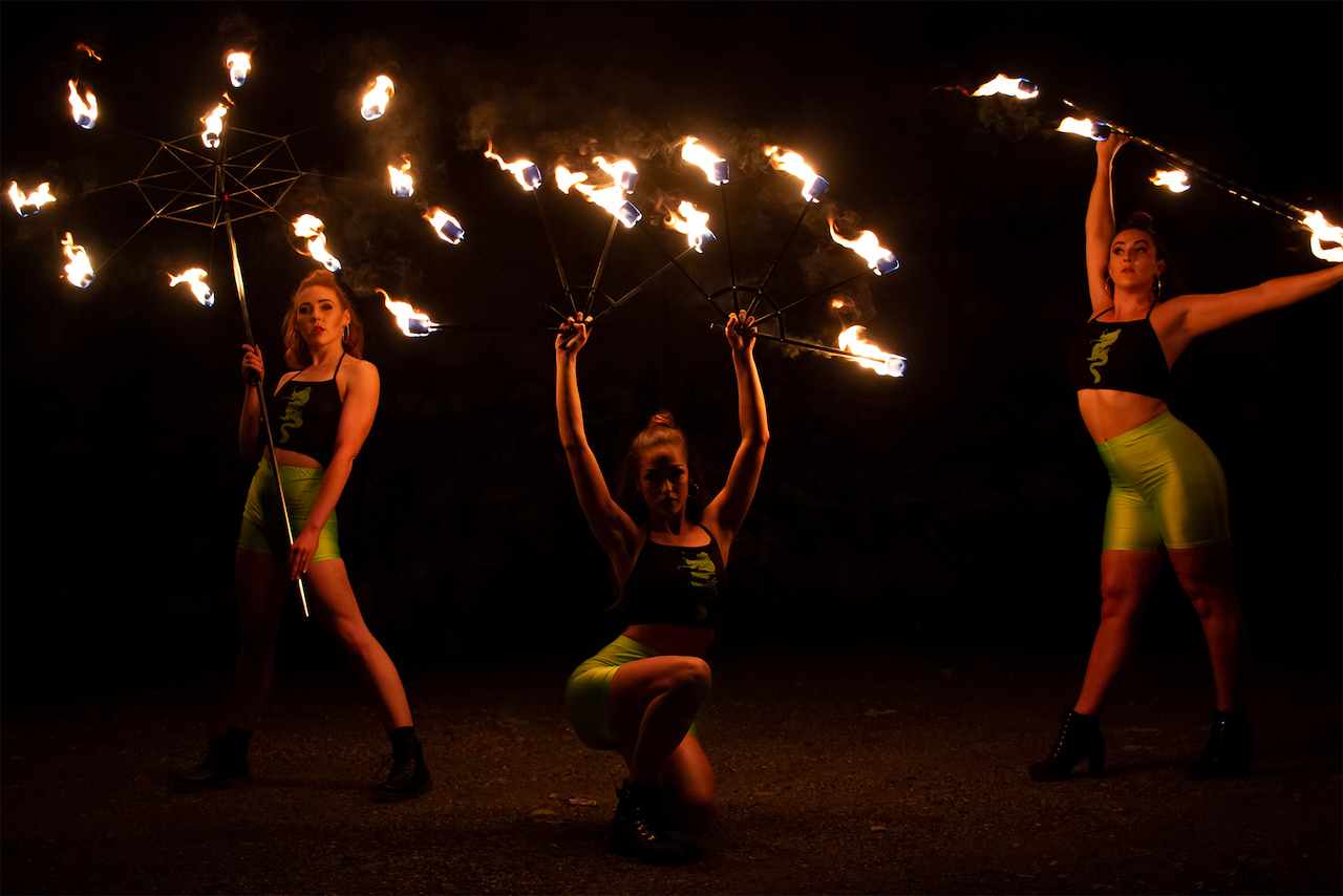 Dancers performing with fire