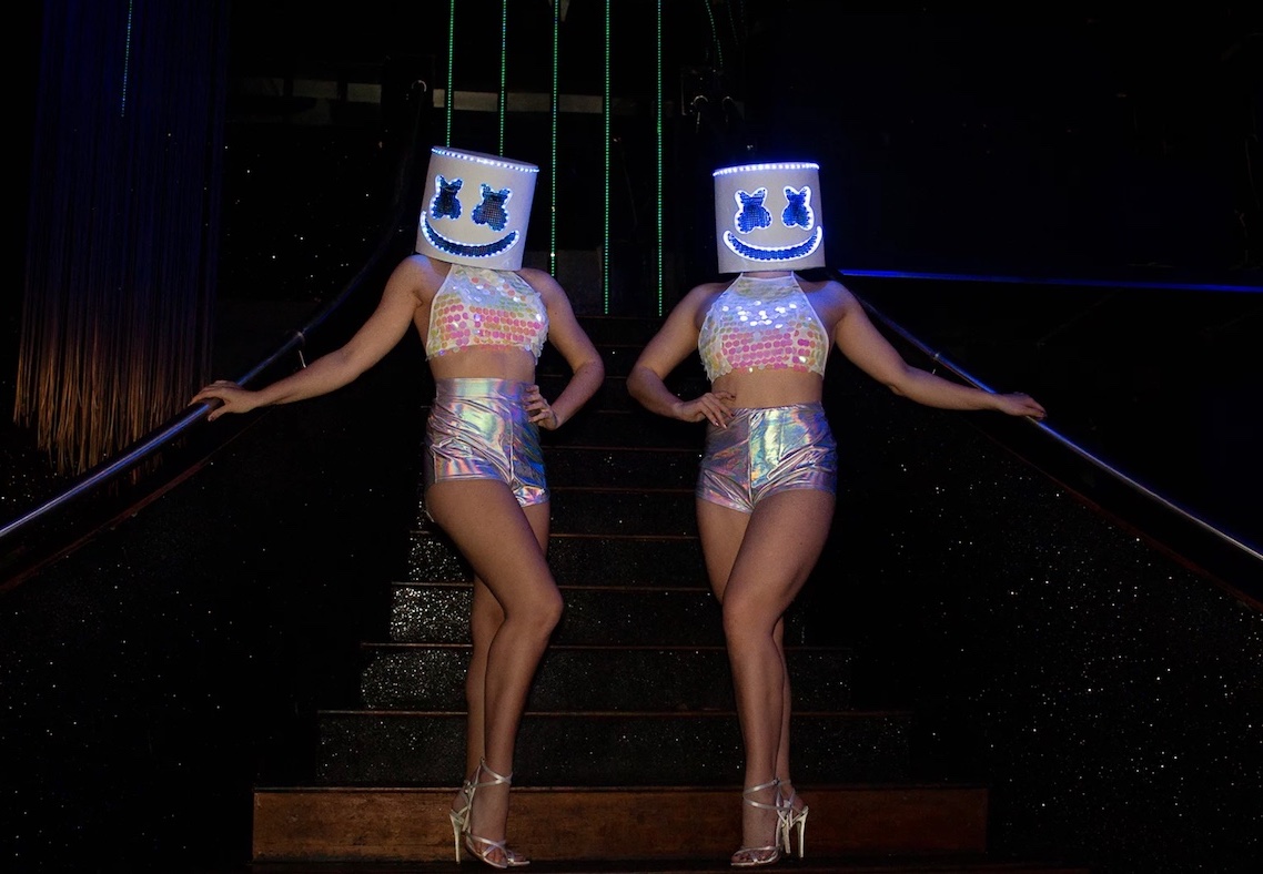 LED Dancers wearing marshmallow heads